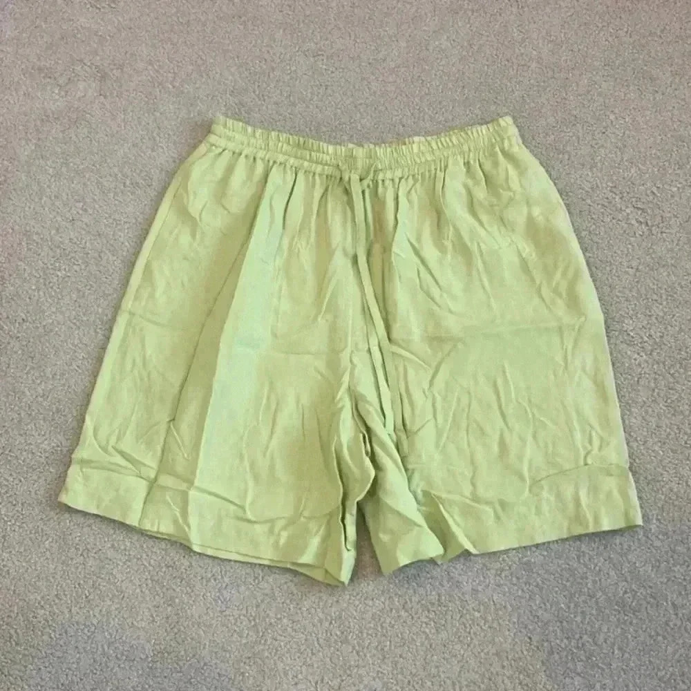 ⭐️ Clio high rise light green silk shorts in size medium